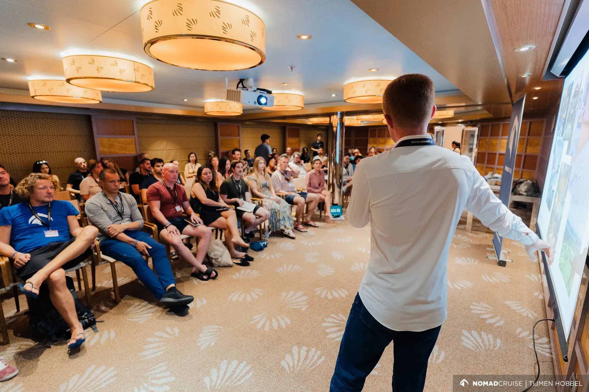 Patrick presenting to packed audience